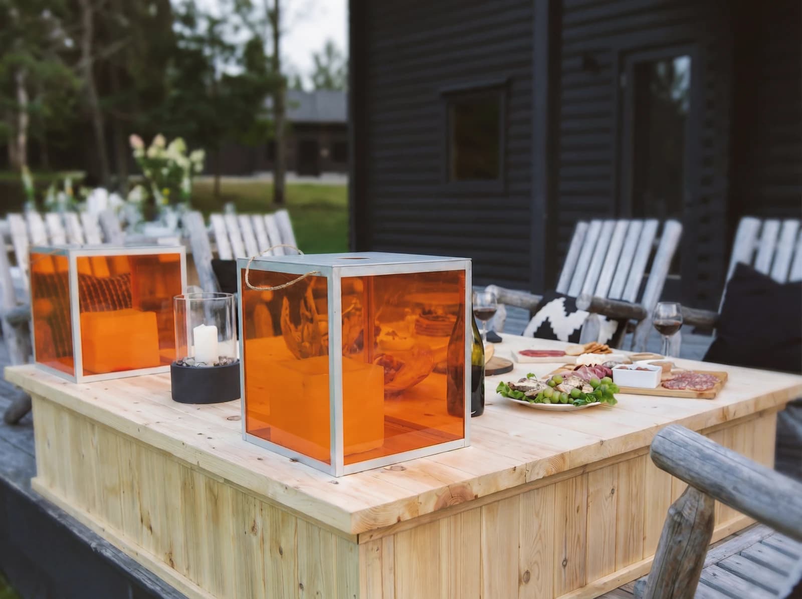 Outdoor table with orange lanterns close-up