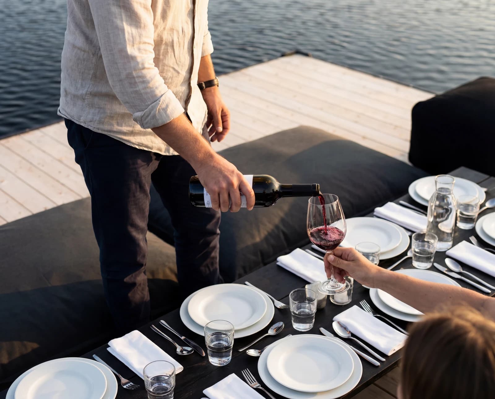 Friends prepping food at the outdoor bar